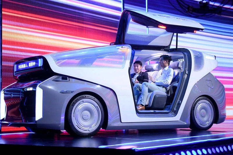 Baidu has unveiled a robotic cab concept and a second-generation artificial intelligence computer chip.